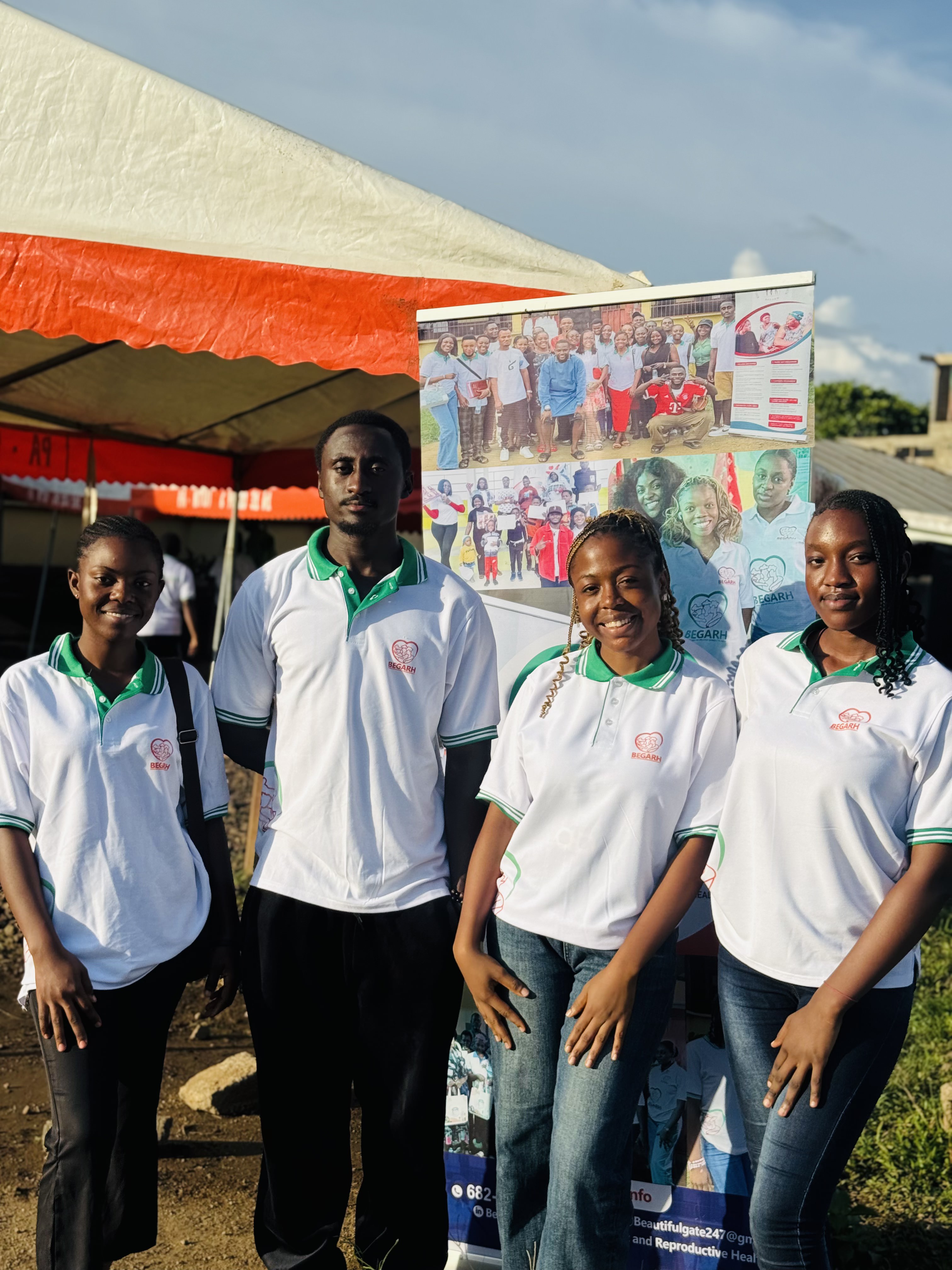 Young Cameroonian students smiling, BEGARH youth education program